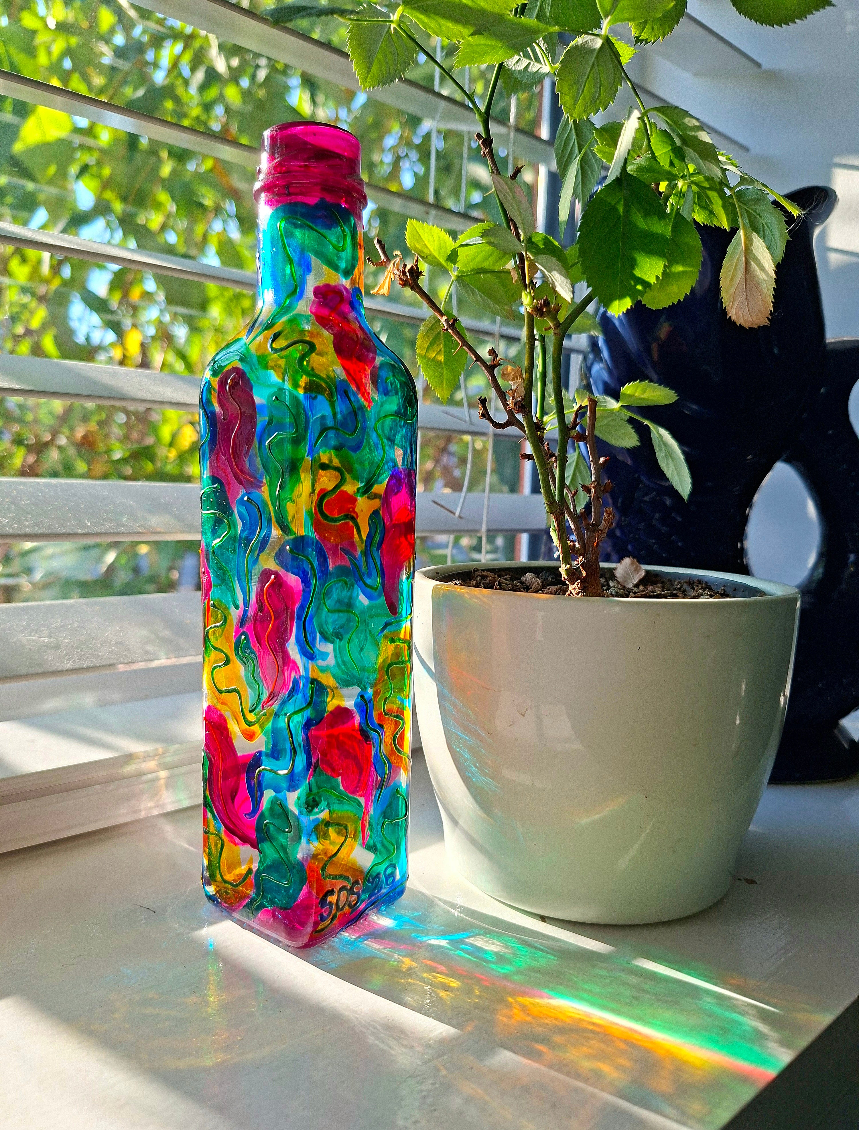 "Swiggle McSwizzle" Repurposed Bottle
